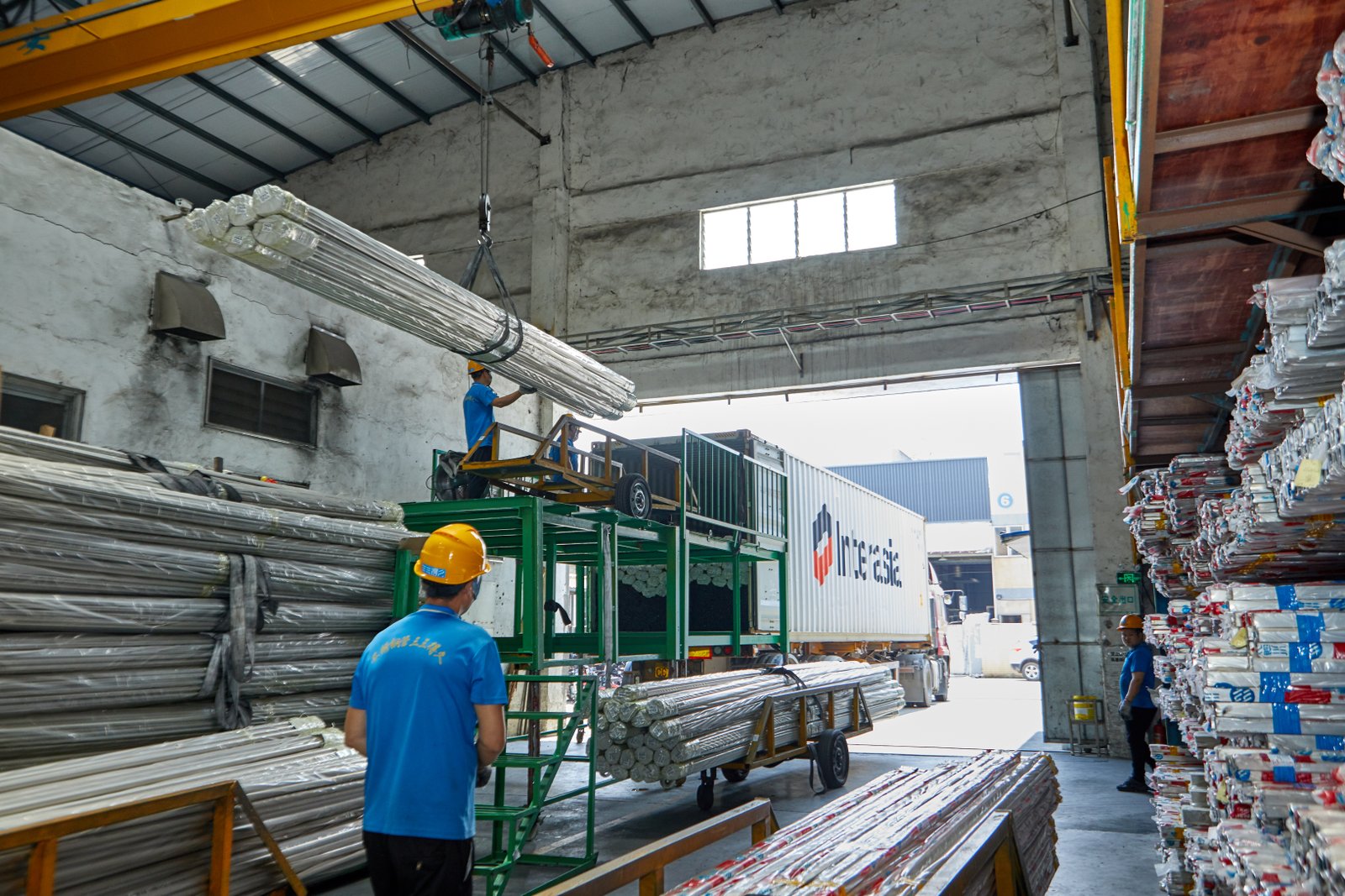 MFY export packaging and overhead lifting system for efficient tube loading and logistics
