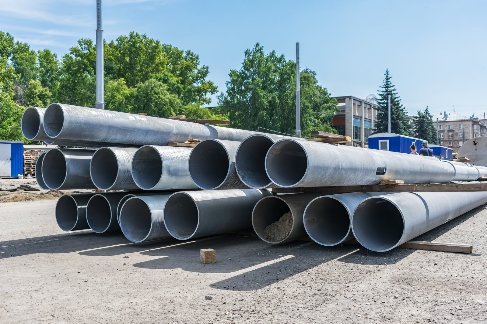 Rough-cut industrial stainless steel pipes ready for machining or welding applications